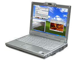 Dell XPS M1210 Intel Core 2 Duo 1.8Ghz T5600 12.1 WXGA 4GB 80GB DVDRW  Webcam Black Windows XP Media Center Edition 2005